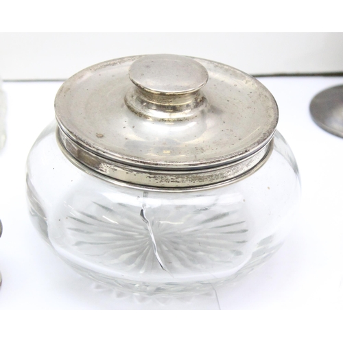 1084 - 3 silver napkin rings, a silver lidded powder jar (af), a silver mounted scent bottle and a pair of ... 