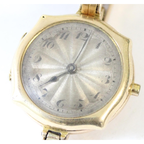 1327 - A 9ct gold cased Rolex wristwatch with an expanding 9ct gold strap, case import marked for London 19... 