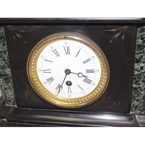 1329 - An antique slate cased mantel clock with key and pendulum and a vintage brass anniversary clock (2)