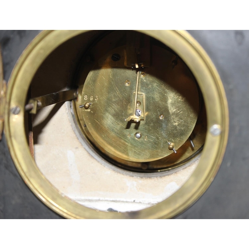 1329 - An antique slate cased mantel clock with key and pendulum and a vintage brass anniversary clock (2)