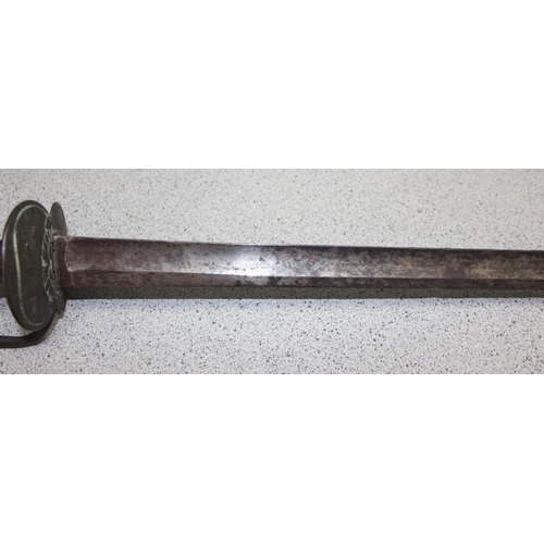 1460 - An antique style sword with clamshell guard and a wire wrap handle, seemingly unmarked, with broken ... 