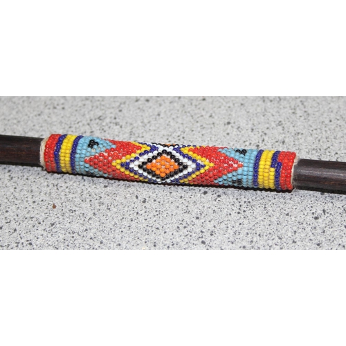 1461 - A vintage Zulu style spear with beadwork grip, approx 76cm long