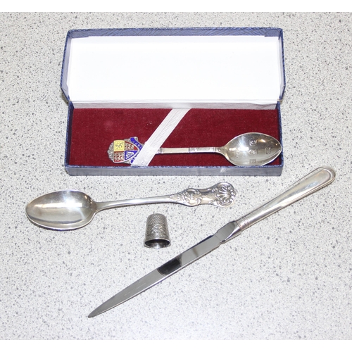 1053A - A Victorian Scottish silver teaspoon, Glasgow 1866, a silver and enamel 1977 silver Jubilee spoon in... 