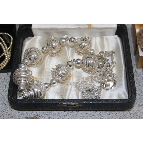 1103 - Qty of assorted jewellery, mainly silver and some silver plated items, the bracelets & large necklac... 