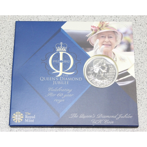 1298 - A Royal Mint 2012 Coin of the Year set & 2 2012 commemorative £5 coins