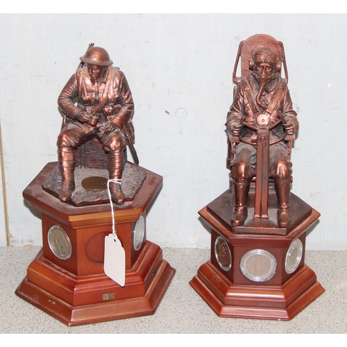 1462 - Two Danbury mint bronzed collectors models of WWI soldiers / pilots mounted on wooden plinths each h... 