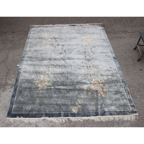 202 - A large silver coloured flower rug, approx 370cm x 276cm