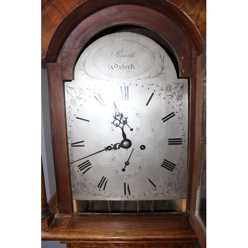 1318A - An early 19th century oak cased 8 day longcase clock by Rowell of Oxford, the silvered dial with 2 s... 