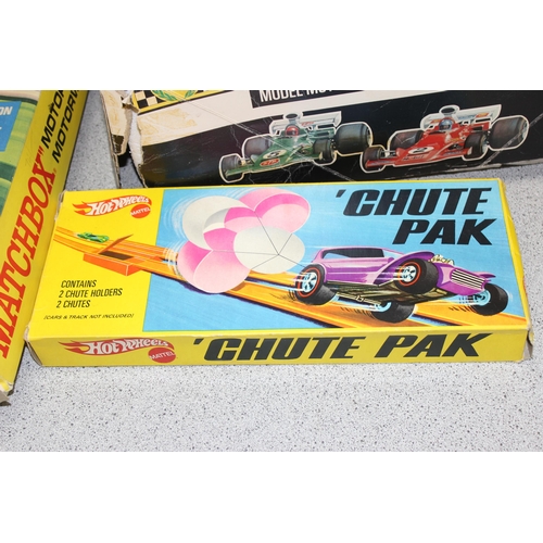 1538A - Matchbox M-1 Motorway set, a Scalextric C547 set in box and a Hot Wheels Chute Pak (3)