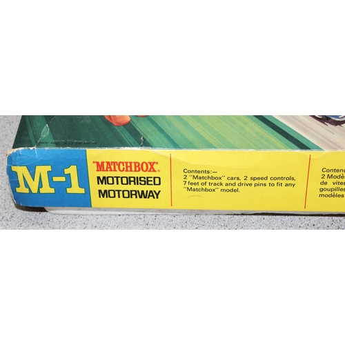 1538A - Matchbox M-1 Motorway set, a Scalextric C547 set in box and a Hot Wheels Chute Pak (3)