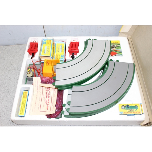 1538A - Matchbox M-1 Motorway set, a Scalextric C547 set in box and a Hot Wheels Chute Pak (3)