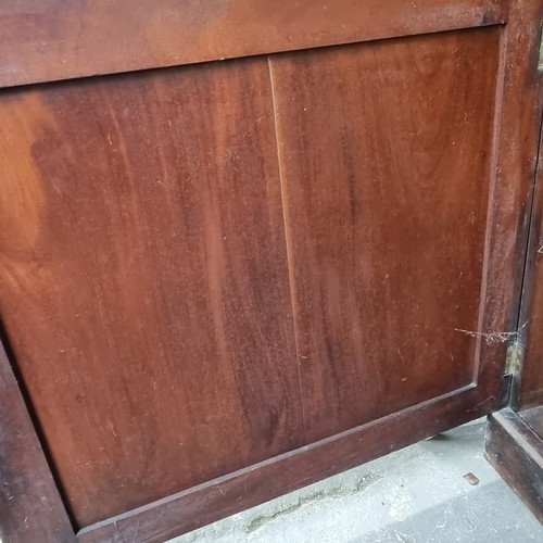 109 - A large 19th century mahogany glazed bookcase with cupboard base, approx 220cm tall x 158cm wide