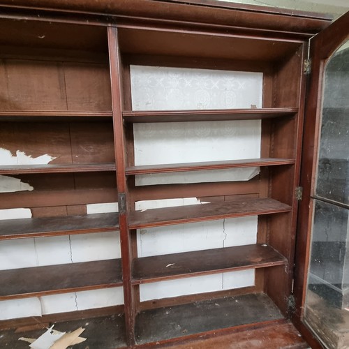 109 - A large 19th century mahogany glazed bookcase with cupboard base, approx 220cm tall x 158cm wide