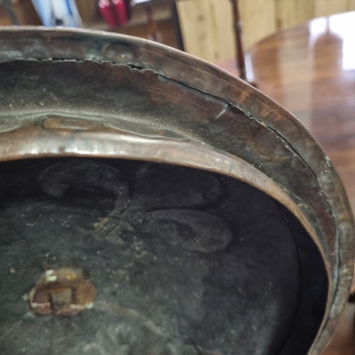 272 - An impressive Art Nouveau period copper coal bucket with embossed motifs, approx 35cm in diameter