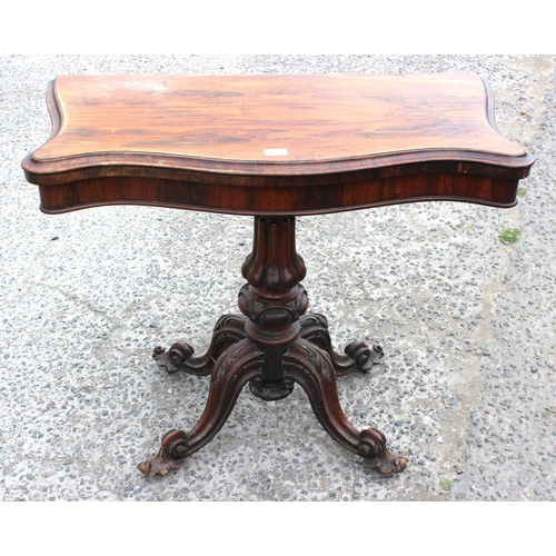 33 - A 19th century rosewood card table with carved base and red gilt tooled leather interior, approx 93c... 