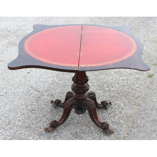 33 - A 19th century rosewood card table with carved base and red gilt tooled leather interior, approx 93c... 