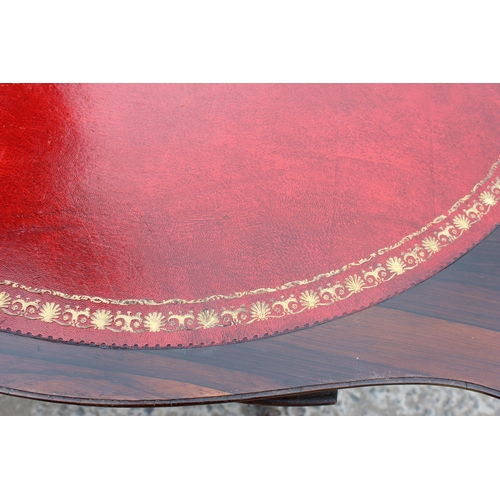 33 - A 19th century rosewood card table with carved base and red gilt tooled leather interior, approx 93c... 