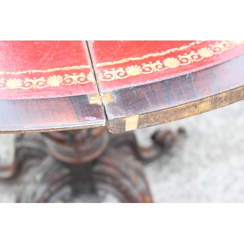 33 - A 19th century rosewood card table with carved base and red gilt tooled leather interior, approx 93c... 