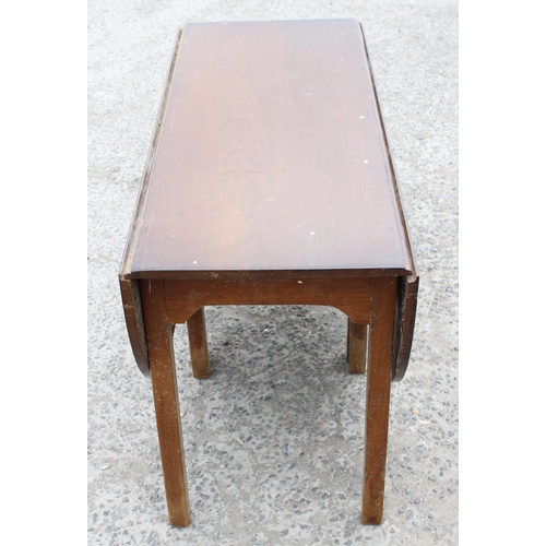 42 - An antique mahogany dropleaf or gate leg table, possibly a smaller wake table, approx 148cm wide x 7... 