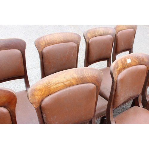 25 - A set of 10 Victorian mahogany and studded brown leather dining chairs with deep rail, possibly Scot... 