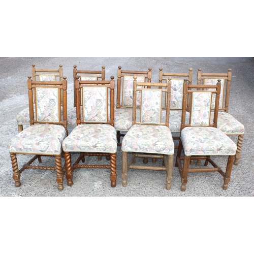 13 - A matched set of 9 Arts & Crafts period oak chairs with later upholstery, the backs matching, some w... 