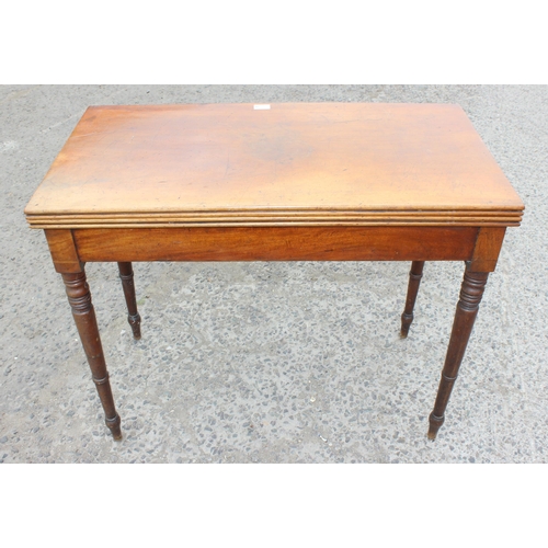 27 - A Victorian mahogany tea table with turned legs, approx 93cm wide x 75cm tall x 93cm deep when open