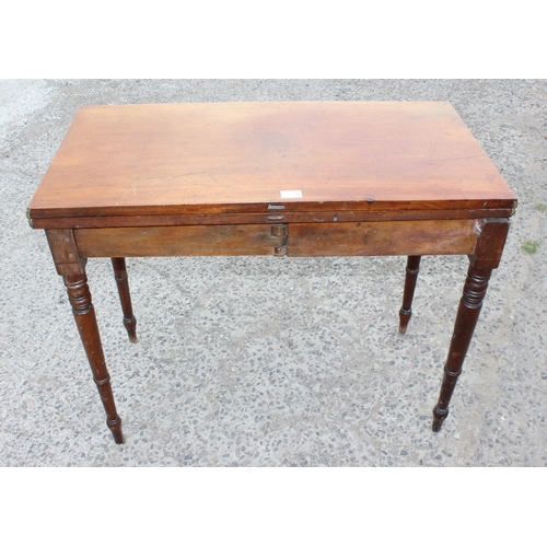 27 - A Victorian mahogany tea table with turned legs, approx 93cm wide x 75cm tall x 93cm deep when open