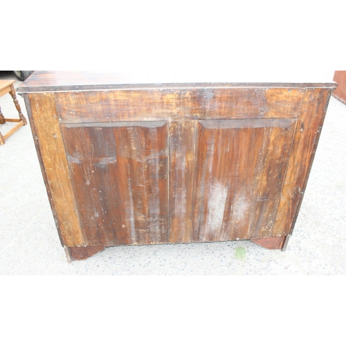 35 - A 19th century mahogany sideboard with 2 drawers over 2 cupboards and brass fittings, approx 126cm w... 