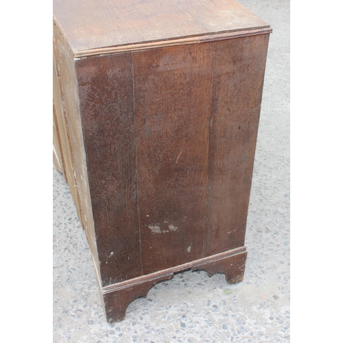 18 - A Georgian 2 over 3 oak chest of drawers with brass handles, approx 96cm wide x 94cm tall x 68cm dee... 