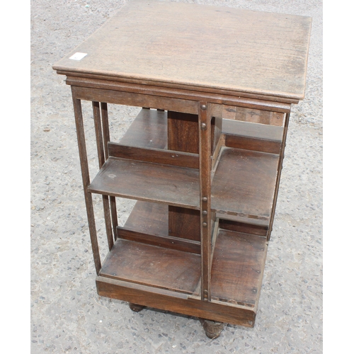 8 - An early 20th century revolving bookcase, approx 49cm wide x 87cm tall x 49cm deep, AF