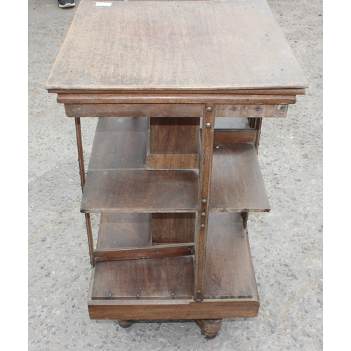 8 - An early 20th century revolving bookcase, approx 49cm wide x 87cm tall x 49cm deep, AF