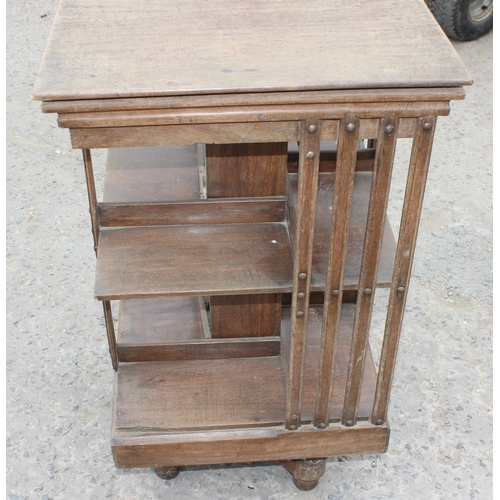 8 - An early 20th century revolving bookcase, approx 49cm wide x 87cm tall x 49cm deep, AF