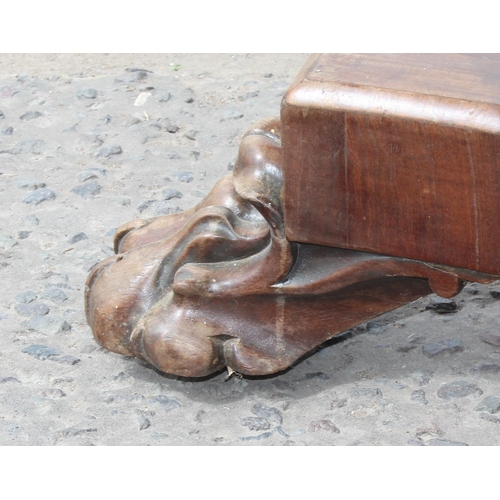 28 - A 19th century mahogany tilt topped breakfast table with impressive carved pedestal base with lion p... 