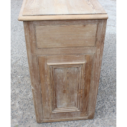 1 - A 19th century pitch pine sideboard with 3 drawers over 3 cupboards, approx 137cm wide x 92cm tall x... 