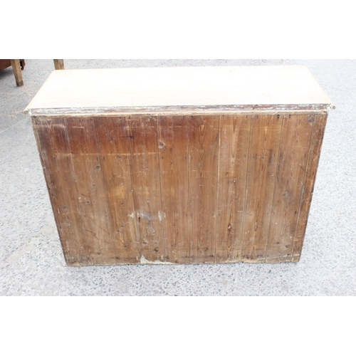 1 - A 19th century pitch pine sideboard with 3 drawers over 3 cupboards, approx 137cm wide x 92cm tall x... 