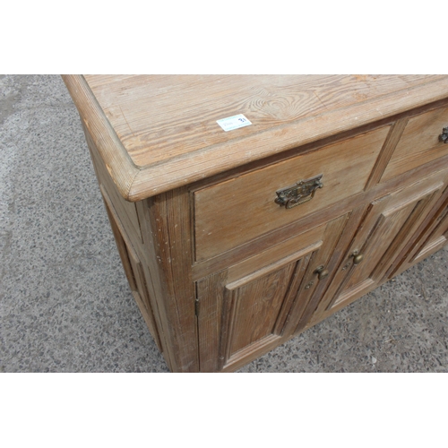 1 - A 19th century pitch pine sideboard with 3 drawers over 3 cupboards, approx 137cm wide x 92cm tall x... 