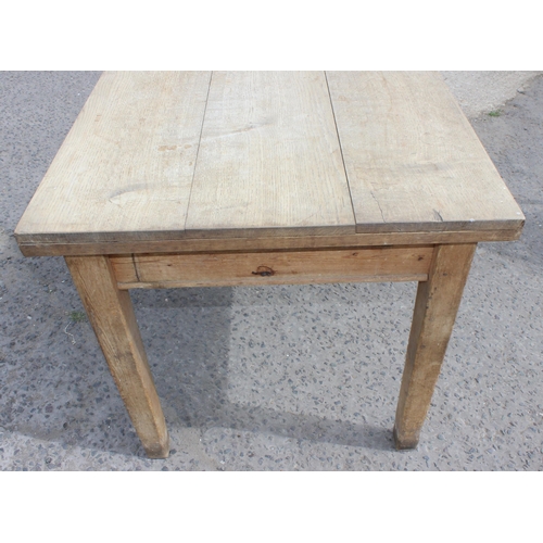 44 - An antique farmhouse kitchen table with single drawer, pine base with light oak top, approx 170cm wi... 