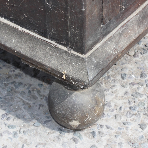 14 - An 18th century 2 door oak cupboard standing on ball feet, approx 130cm wide x 102cm tall x 55cm dee... 