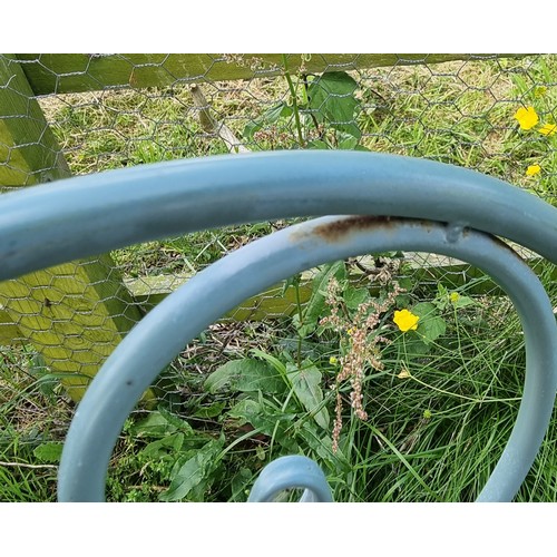 312 - A metal garden bistro set with 2 chairs, the table and chairs with colourful glazed pottery inserts,... 