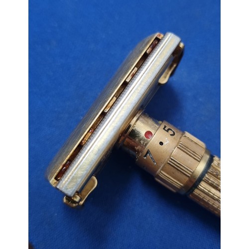 1608 - An unusual vintage Gillette gold plated razor, believed to be a D-1 Toggle