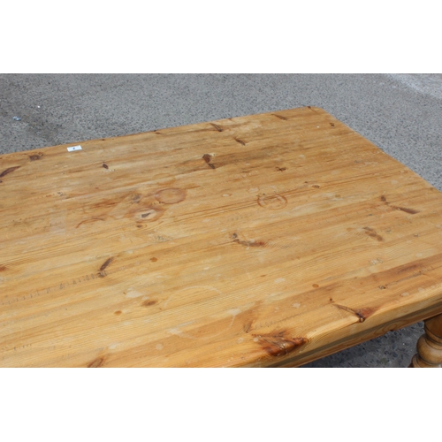 2 - A vintage pine farmhouse country kitchen dining table on turned legs, approx 151cm wide x 91cm tall ... 