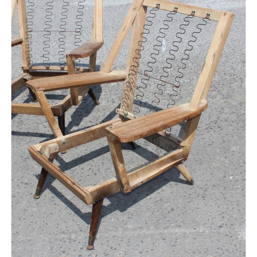 50 - A pair of retro mid-century chair frames, possibly Swedish Lounge Chairs, in the style of Folke Ohls... 