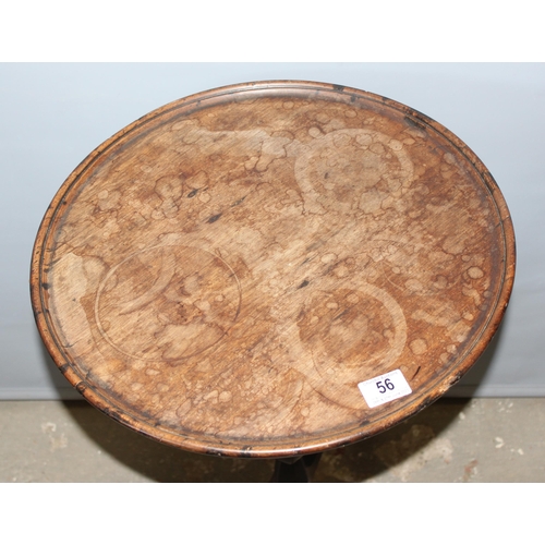 56 - A small antique mahogany wine table with tripod base, approx 45cm in diameter x 70cm tall