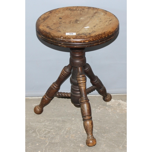 59 - An unusual vintage oak twist topped stool with turned legs, approx 35cm wide x 50cm tall