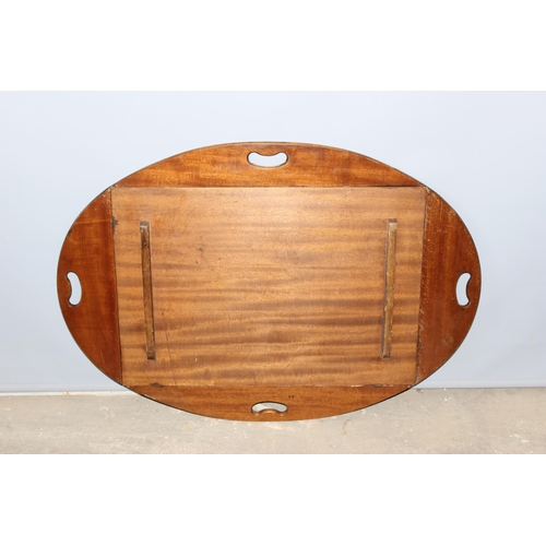 63 - An antique folding mahogany butler's tray with brass hinges, approx 108cm wide x 76cm deep