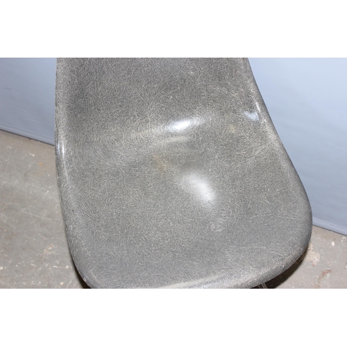 66 - Charles & Ray Eames for Herman Miller: an early retro moulded fibreglass chair on metal 'Eiffel towe... 