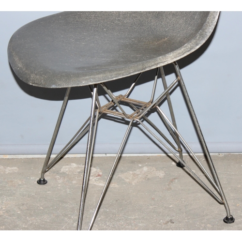 66 - Charles & Ray Eames for Herman Miller: an early retro moulded fibreglass chair on metal 'Eiffel towe... 