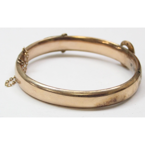 1101 - 9ct gold cuff bangle formed as an engraved belt, marked rubbed but XRF confirmed to be 9ct gold, app... 