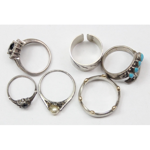 1110 - 6 assorted silver rings to inc a coronet wedding band marked for Birmingham 2002, approx size U, a f... 