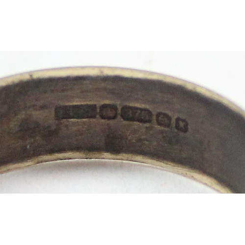 1115 - A 9ct gold wedding band ring with engraved decoration, Birmingham 1947, approx size N, approx 1.88g ... 